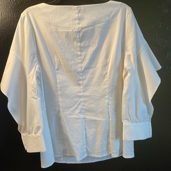 WHITE BLOUSE WITH DRAPED OPEN ARM SLEEVE WITH ELEGANT BUTTON CLOSURE - Picture 6 of 9